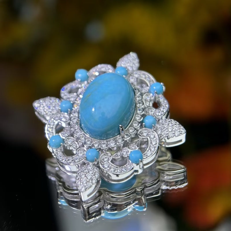 Oval Cabochon Turquoise & White Sapphire Floral Halo Brooch