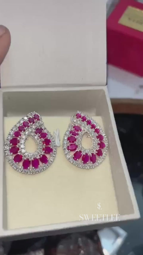 Spiral Ruby Drop Earrings with Moissanite Pavé