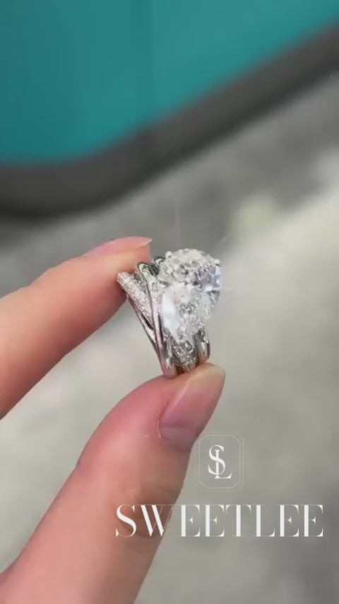 Diagonally Set Tear Drop 4 CT Pear Cut Criss Cross Shank Pave Moissanite Ring